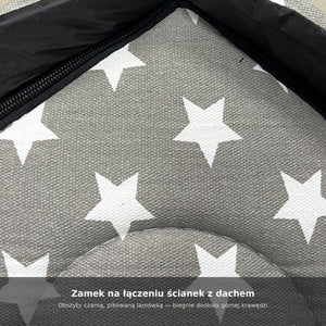 Zbliżenie na czarny zamek biegnący wzdłuż górnej krawędzi ścianki, tam gdzie ściana łączy się z dachem